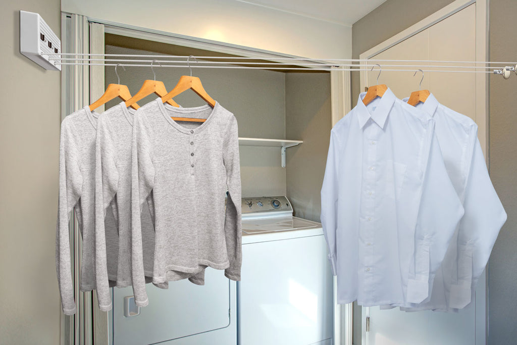 Tendedero retráctil de 3 lineas